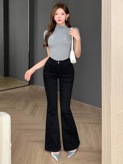 DAZY بنطلون جينز أرجل جرس على الطراز الغربي مغسول للنساء