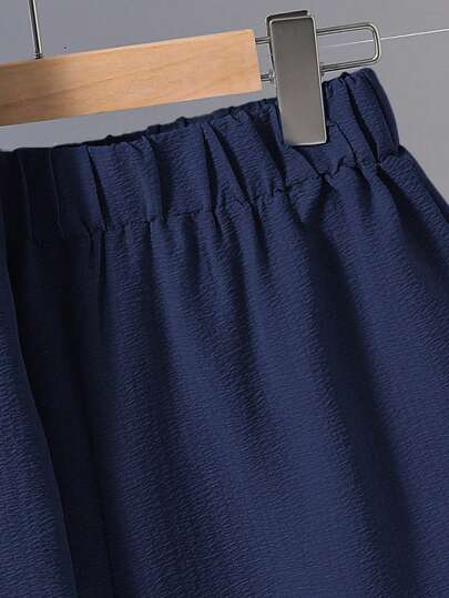 SHEIN مجموعة قميص كم قصير وشورت مريحة للمراهقين الذكور، نسيج مضلع، للارتداء في الربيع، قطعتان