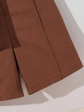 SHEIN طقم قميص كاجوال بياقة على شكل حرف V وأشورت للأولاد المراهقين