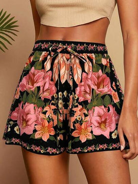 Travachic شورت صيفي مريح بخصر رباط مزخرف بالزهور، شورت صيفي فضفاض، شورت صيفي للنساء، ملابس شاطئ، شورت زهور استوائية، أناقة كاجوال للنساء، خريفي للنساء، أنيق خريفي، للخروج، أنيق، حفلات للنساء، شورت زهور بوهيمي