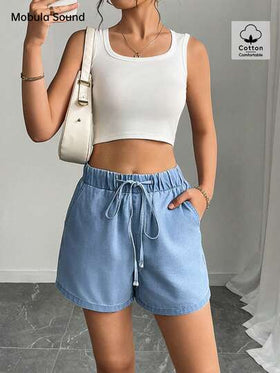 شورت جينز نسائي أنيق بخصر مطاطي فضفاض بلون أزرق، بطراز عصري وأنيق مناسب للعطلات والمناسبات البسيطة والموسيقى، مثالي للربيع والصيف.