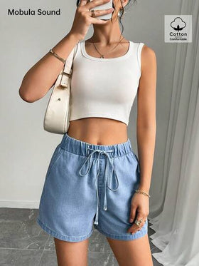 شورت جينز نسائي أنيق بخصر مطاطي فضفاض بلون أزرق، بطراز عصري وأنيق مناسب للعطلات والمناسبات البسيطة والموسيقى، مثالي للربيع والصيف.