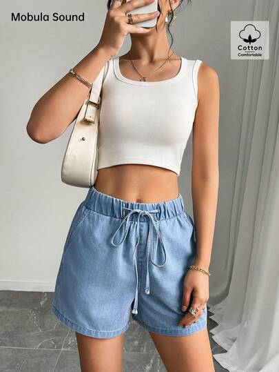 شورت جينز نسائي أنيق بخصر مطاطي فضفاض بلون أزرق، بطراز عصري وأنيق مناسب للعطلات والمناسبات البسيطة والموسيقى، مثالي للربيع والصيف.