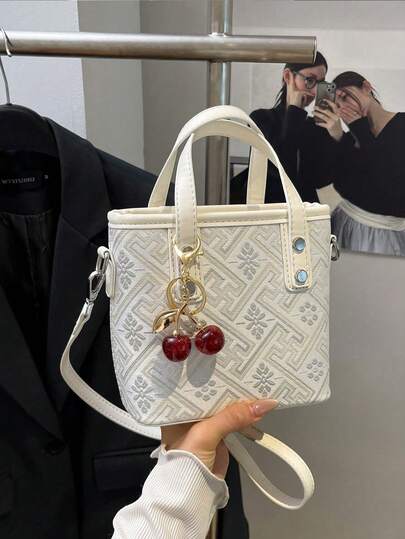 حقيبة يد مطرزة بطراز صيني جديد للنساء، حقيبة سعة كبيرة ذات طراز جديد لربيع وصيف 2025 ، حقيبة كتف متنوعة عالية الجودة مع علاقة بطابع عشوائي