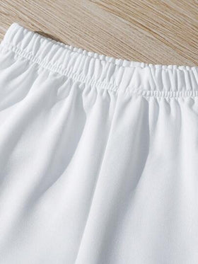 SHEIN مجموعة قميص هيب كاجوال قصير الأكمام مطبوع بطباعة الحروف مع شورت أحادي اللون مكونة من قطعتين لتويني البوي