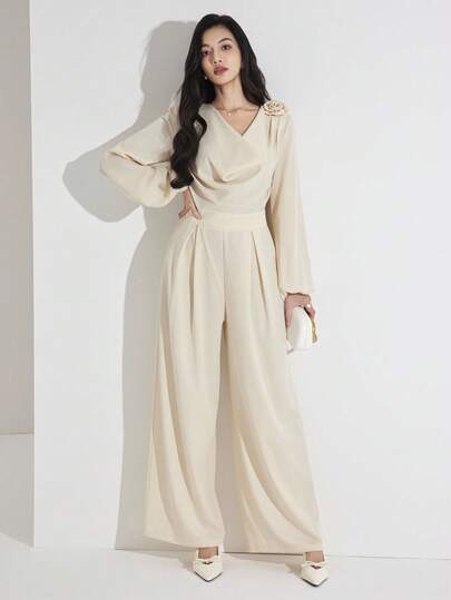 Heiryn جمبسوت طويلة الأكمام أنيقة للنساء بياقة على شكل حرف V مزينة بزهور ثلاثية الأبعاد بلون واحد