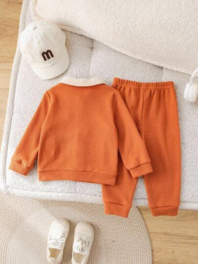 SHEIN مجموعة ملابس علوية طويل الأكمام وبنطال خصر مطاطي مزين بألوان متباينة، مناسبة لحفلات عيد الميلاد والحفلات المسائية والأعراس وحفلات استقبال المولود الجديد وعيد الميلاد الأول، مقاس طفل ولد، موسم الخريف/الشتاء، 2 قطعة
