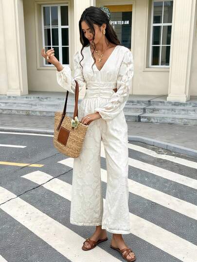 SHEIN Frenchy جمبسوت نسائية بأكمام طويلة وظهر مكشوف بياقة على شكل حرف V وبلون أحادي، مناسبة للارتداء اليومي