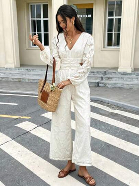 SHEIN Frenchy جمبسوت نسائية بأكمام طويلة وظهر مكشوف بياقة على شكل حرف V وبلون أحادي، مناسبة للارتداء اليومي