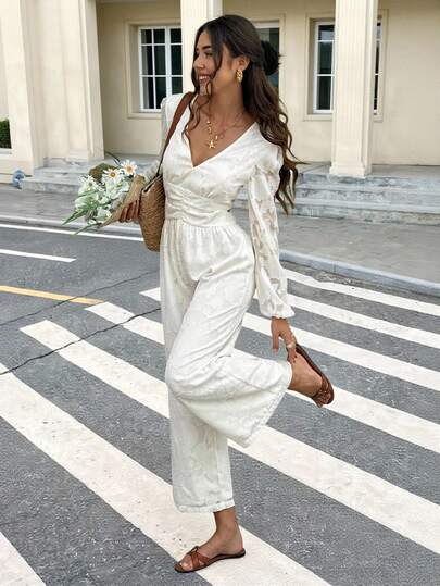 SHEIN Frenchy جمبسوت نسائية بأكمام طويلة وظهر مكشوف بياقة على شكل حرف V وبلون أحادي، مناسبة للارتداء اليومي