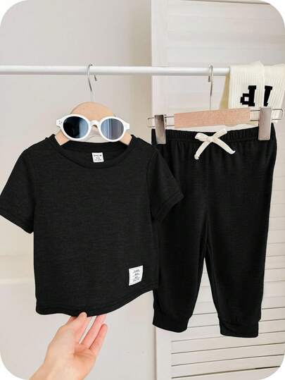 SHEIN طقم قطني ناعم للأطفال الرضع بنطال خصر مطاطي وبلوزة كم قصير قطعتان، ملابس كاجوال مناسبة للخروج في الربيع والصيف، للمدرسة والمنزل