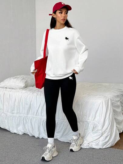 SHEIN EZwear مجموعة من 2 قطعة: بلوزة رياضية فضفاضة بياقة طاقم وبنطلون ضيق