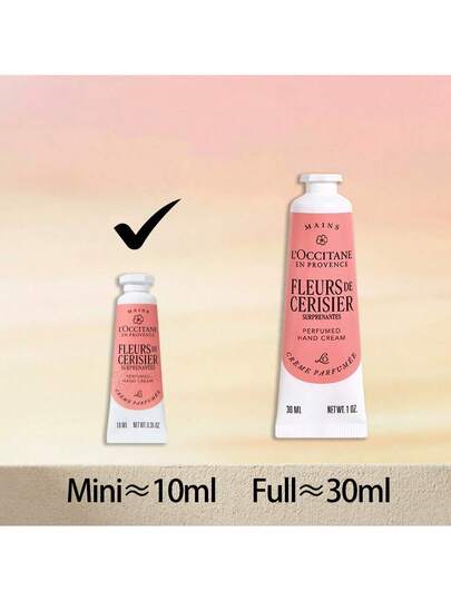 L'Occitane كريم اليد المعطر بحجم السفر بعطر زهور الكرز المذهلة لجميع أنواع البشرة، مرطب ومرطب لليدين، كريم حماية لليدين الجافة 10مل/0.34أونصة