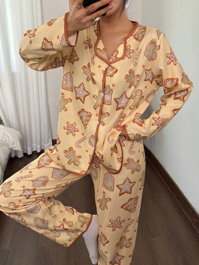 SHEIN طقم بيجامة نسائية كاجوال بسروال وبلوزة كم طويل مطبوع عليها رسومات عيد الميلاد مثل رجل زنجبيل والثلج، ملابس خريف وشتاء