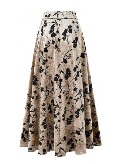 تنورة أنيقة من الفيلكرو الأبريكوت مع طباعة زهرية، قصة كاجوال بخصر مرتفع وخصر مطاطي مرن، طول الركبة بقصة A-line متسعة، جودة أنيقة مناسبة للخريف والشتاء