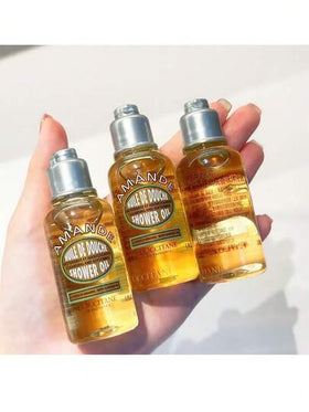 L'Occitane زيت دش لوكسيتان الأمند | 35 مل حجم صغير، مُزود ببشور اللوز، مرطب وناعم لجلود الجافة، لاستخدام يومي