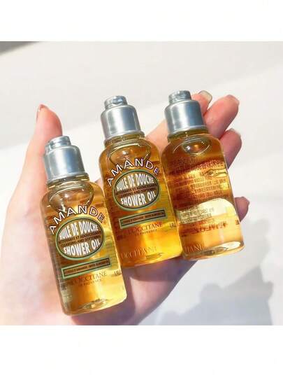 L'Occitane زيت دش لوكسيتان الأمند | 35 مل حجم صغير، مُزود ببشور اللوز، مرطب وناعم لجلود الجافة، لاستخدام يومي