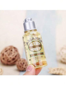 L'Occitane زيت دش لوكسيتان الأمند | 35 مل حجم صغير، مُزود ببشور اللوز، مرطب وناعم لجلود الجافة، لاستخدام يومي
