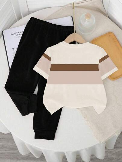 SHEIN طقم ملابس علوية وبنطلون قصير الأكمام بياقة دائرية وطراز مخطط للأولاد الرضع