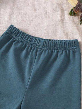 SHEIN Playful Pals مجموعة ملابس علوية بياقة مستديرة بطبعة ديناصور وبنطلون أخضر سادة مناسبة للأطفال الصبية، مناسبة للعب في الخارج والملابس الكاجوال والرياضية، للربيع والخريف