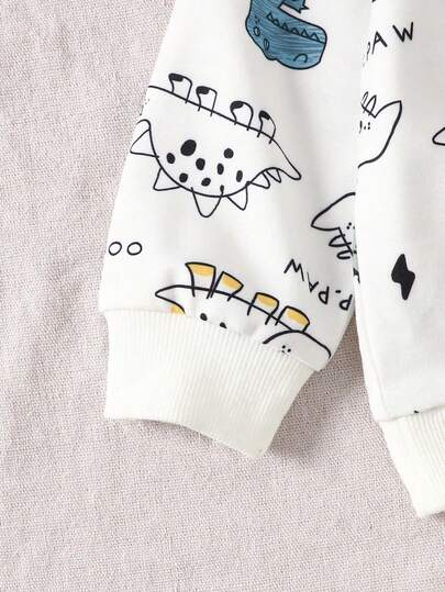 SHEIN Playful Pals مجموعة ملابس علوية بياقة مستديرة بطبعة ديناصور وبنطلون أخضر سادة مناسبة للأطفال الصبية، مناسبة للعب في الخارج والملابس الكاجوال والرياضية، للربيع والخريف