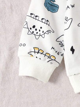SHEIN Playful Pals مجموعة ملابس علوية بياقة مستديرة بطبعة ديناصور وبنطلون أخضر سادة مناسبة للأطفال الصبية، مناسبة للعب في الخارج والملابس الكاجوال والرياضية، للربيع والخريف