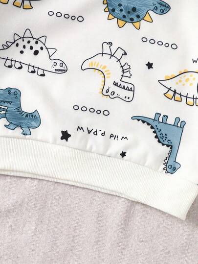 SHEIN Playful Pals مجموعة ملابس علوية بياقة مستديرة بطبعة ديناصور وبنطلون أخضر سادة مناسبة للأطفال الصبية، مناسبة للعب في الخارج والملابس الكاجوال والرياضية، للربيع والخريف