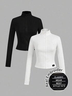 SHEIN EZwear قطعتان من ملابس اليوغا والياقة البدنية المرنة المصممة بشكل مثالي باللونين الأبيض والأسود، تي شيرت بأكمام طويلة مزين بطباعة حرفية أنيقة مناسبة للخريف والشتاء