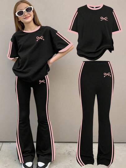 SHEIN Leap Crew مجموعة رياضية عتيقة، زخرفة فيونكة صغيرة، بلوزة قصيرة الأكمام بياقة طاقم فضفاضة ذات خطوط سوداء وبيضاء كريمية، وبنطلون واسع ذو قصة جرس، مناسبة للصيف، مجموعة قطعتين للفتيات المراهقات بطراز بسيط