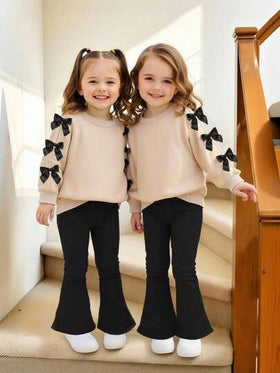 Emery Rose Kids Emery Rose Kids طقم ملابس بناتي مكون من قطعتين، سويت شيرت كاجوال بياقة دائرية بلون سادة مع بنطال ضيق، طقم ملابس بناتي من أسفل جرس، طقم ملابس بناتي من قطعتين، ملابس بناتي في سن المراهقة، طقم ملابس بناتي من قطعتين، لباس علوي وبنطال بأكمام في