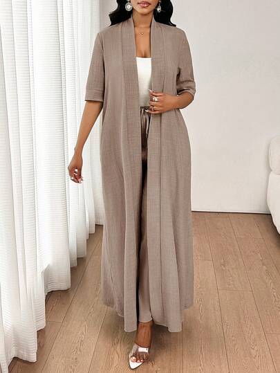 SHEIN Lady بدلة سيدات مكونة من كارديجان طويل بلون أحادي أنيق وكاجوال مناسب للذهاب للعمل والعطلات، وبنطلون مستقيم فضفاض، مناسبة لجميع الفصول