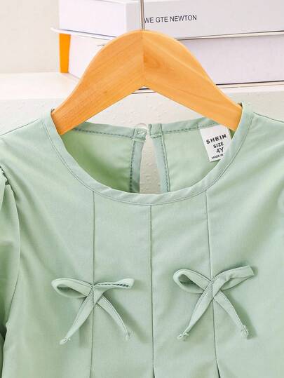 SHEIN Playful Pals مجموعة فتاة شابة أنيقة وحلوة تتكون من ملابس علوية مزينة بفيونكة + بنطلون ساق واسعة، للربيع/الخريف