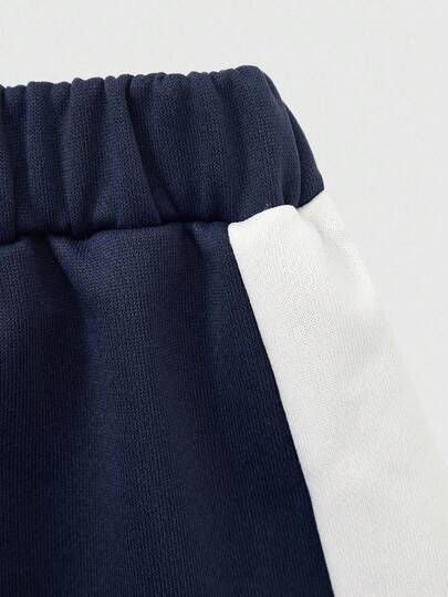 SHEIN Explorewe مجموعة بلوزة وبنطلون رياضي بطباعة الرقم 23 للبنات، بطراز أمريكي رياضي، مناسب للمدرسة والرياضة والارتداء اليومي