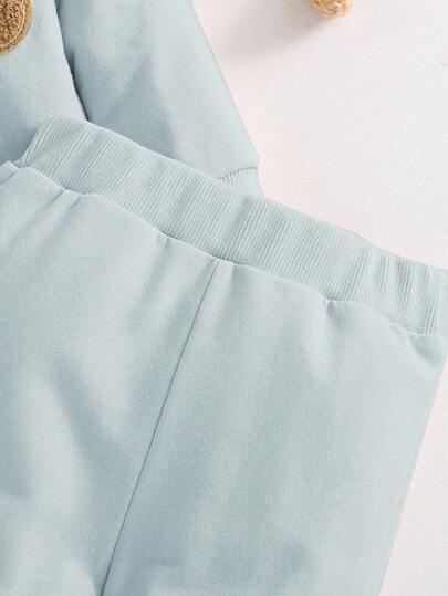 SHEIN طقم ملابس كوري الطراز لحديثي الولادة مكون من بلوزة كنزة مطرزة بشكل دب كرتوني وبنطلون، مريح وملائم، مكون من قطعتين