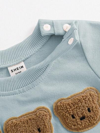 SHEIN طقم ملابس كوري الطراز لحديثي الولادة مكون من بلوزة كنزة مطرزة بشكل دب كرتوني وبنطلون، مريح وملائم، مكون من قطعتين