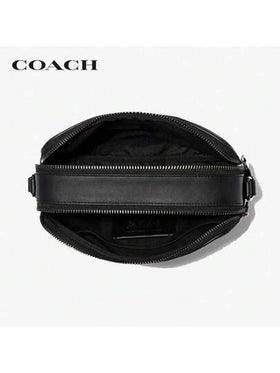 حقيبة كاميرا كلاسيكية للرجال COACH Graham 23، سحر شعار معدني، قماش مطلي وجلد، حقيبة عبر الجسم مربعة بلون أسود فحمي، حقيبة مسافر متوسطة C4149 QBMI5