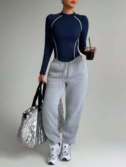 SHEIN Dewbera ملابس علوية رياضية ضيقة بأكمام طويلة وسحاب ملون للنساء
