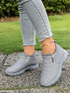بوت كاجوال للكاحل للنساء في الشتاء، لون أحادي مزود بفرو اصطناعي وسُمك في الأرضية، مبطنة بعازل حراري، برؤوس مستديرة وسهلة الارتداء