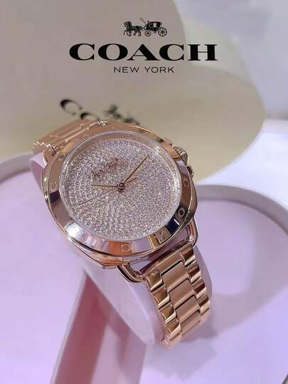 Coach ساعة تاتوم النسائية بمينا ذهبي وردي