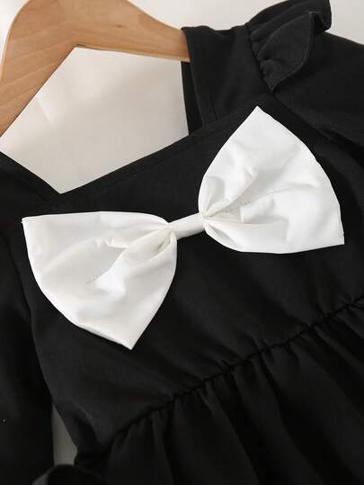 Elladie kids فستان قصير أنيق للبنات للاستخدام اليومي بياقة مربعة وأكمام قصيرة وخصر مشدود مزين بفيونكة ثلاثية الأبعاد وحافة مكسرة، لون أسود وأبيض، مناسب لجميع المواسم