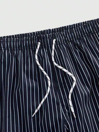 ROMWE MEN Casual شورت رجالي مخطط بحبال شد