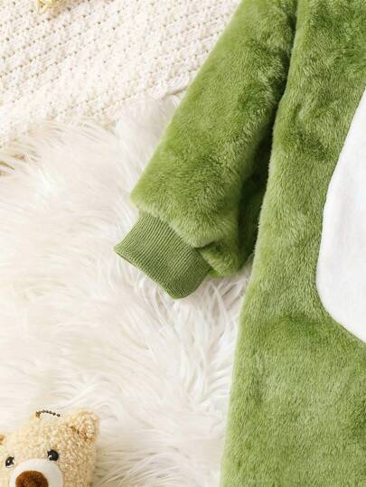 SHEIN Playful Pals طقم بيجاما لطفل صبي مكون من جمبسوت طويلة الأكمام مزودة بقبعة وقفازات، مصنوعة من قماش الفلانيل المزخرف بنقشة وحش أبيض على خلفية خضراء، قطعتان