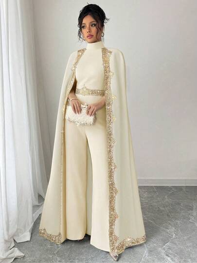 Rafferiza جمبسوت أنيقة للنساء مع رسومات، تصميم كيب طوق عالي ولحاف, ساقين واسعتين