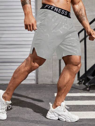 Manfinity Sport Corelite شورتات رياضية للرجال ذات طباعة هندسية وحروف على الخصر