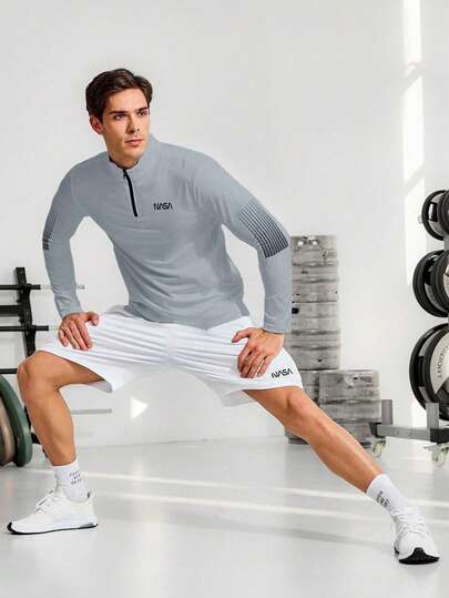 Manfinity Sport Corelite جاكيت رياضي رياضي بسحاب ربع لجرافيك رجالي Manfinity اللياقة البدنية، قميص رجالي عائد للمدرسة، بنطال رياضي رجالي، قمصان رياضة رجالية تنفس