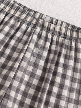 SHEIN Genkimix Kids مجموعة بيجاما بقميص كم طويل وبنطال من قطعتين مطبوع عليها كلب كرتوني وفيونكة للبنات