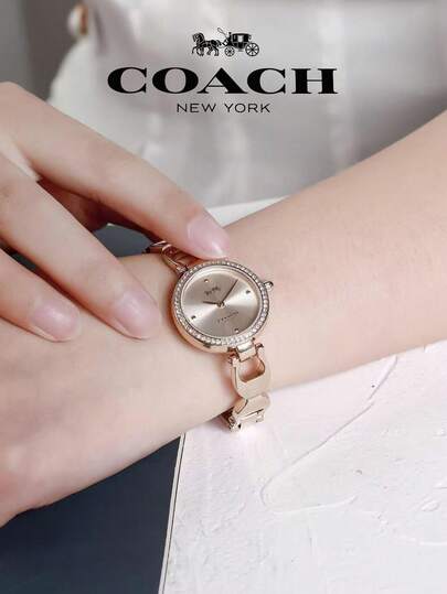 Coach ساعة للنساء بإطار من الفولاذ المقاوم للصدأ باللون الذهبي الوردي وقرص باللون الذهبي الوردي من علامة تجارية بارك