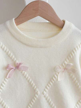 SHEIN Genkimix Kids مجموعة بنطلون وسترة مضفرة للفتيات المراهقات، كنزة صوفية صوفية مزينة بفيونكة ثلاثية الأبعاد مع تنورة مطوية، جميلة وأنيقة، شتوي