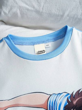 Captain Tsubasa X SHEIN مجموعة بيجاما مكونة من ملابس علوية بأكمام طويلة وطباعة أجنحة كبيرة كرتونية وبنطلون ضيق مرن مناسب للأولاد الصغار، 2 قطعة/طقم