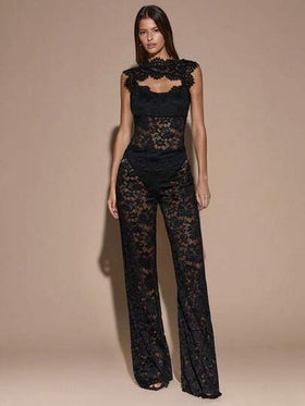 SHEIN BAE جمبسوت نسائية أنيقة للخروج والمناسبات، ذات تصميم أسود شفاف مزين بالدانتيل الأنيق، بتصميم ظهر مكشوف وساق واسعة غير متماثلة، مناسبة للاستخدام اليومي والمناسبات والأعياد مثل عيد الحب والهالوين والكريسماس
